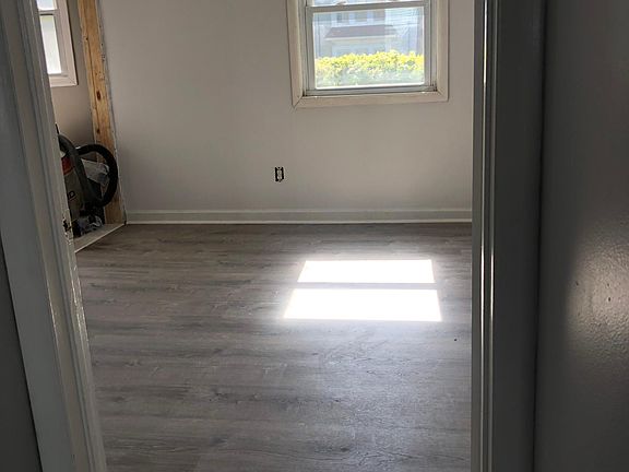 Bedroom with 2 closets and 1/2 bath