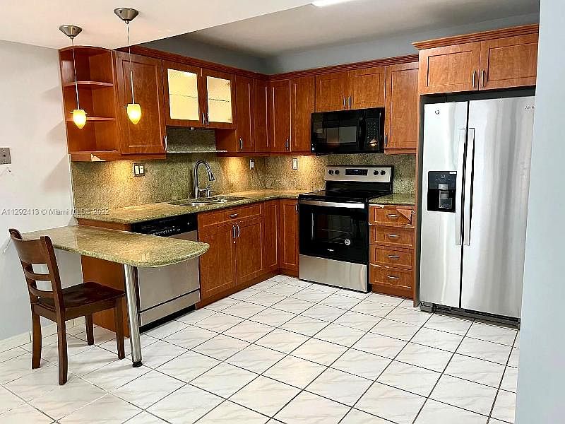 1st image of 8811 SW 132nd Pl #308CW-IV