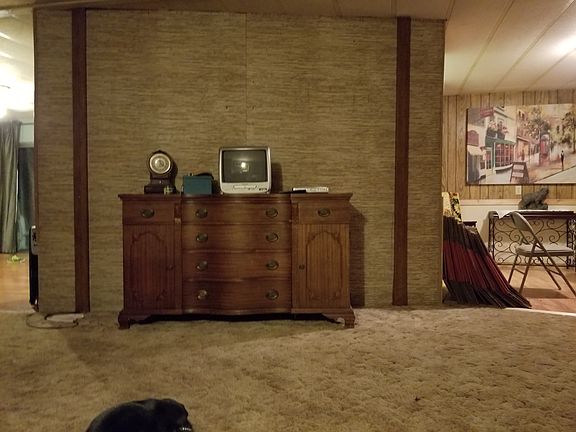 Wall: holds 70+ " flatscreen