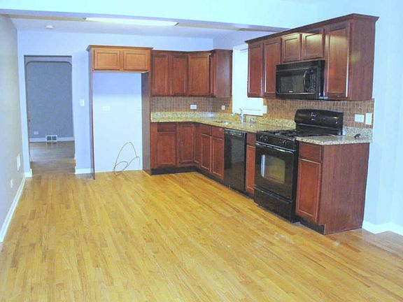5th image of 3632 N Odell Ave