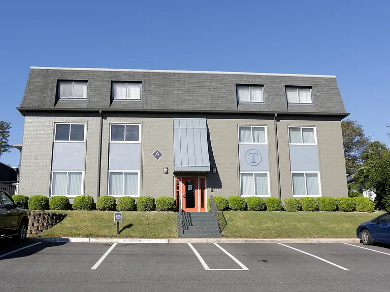 Experience the charm of suburban living with this stylish apartment building.
