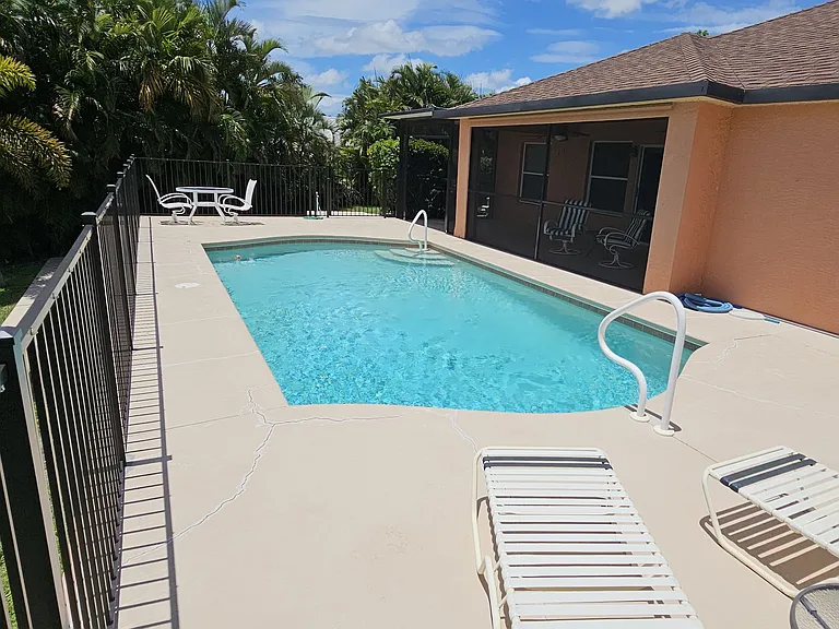 Pool Area looking at screened in Lani