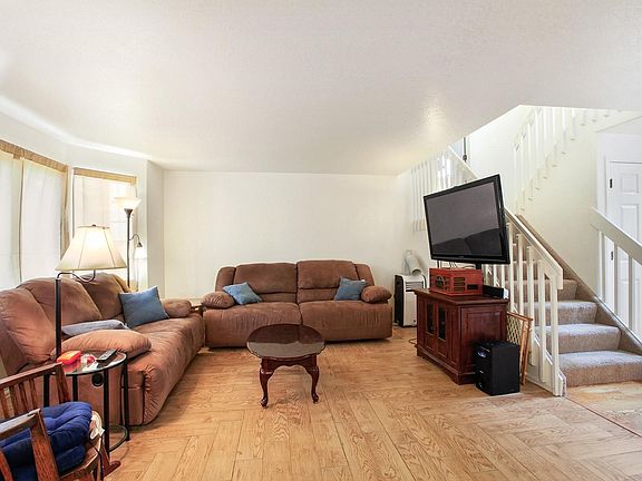 Main level living area with wood design tile
