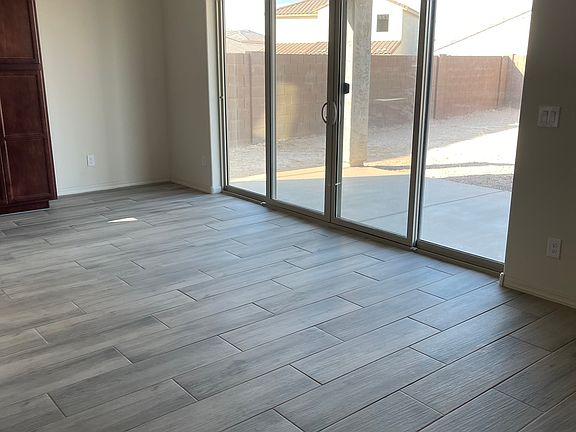 Large sliding window opens from center to both sides. Massive patio cover provides much shade to kitchen.