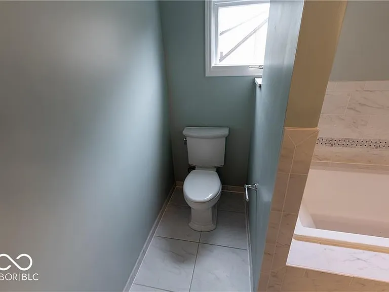 5630 N Delaware St — Photo 24