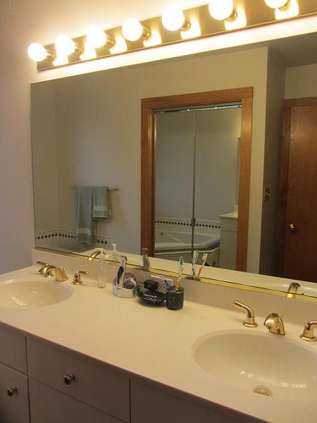 Large double vanity with lots of lighting