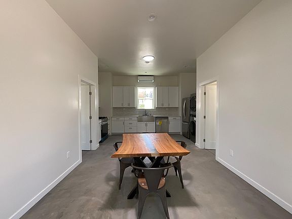 Full kitchen, dining, and living room space to design to your liking