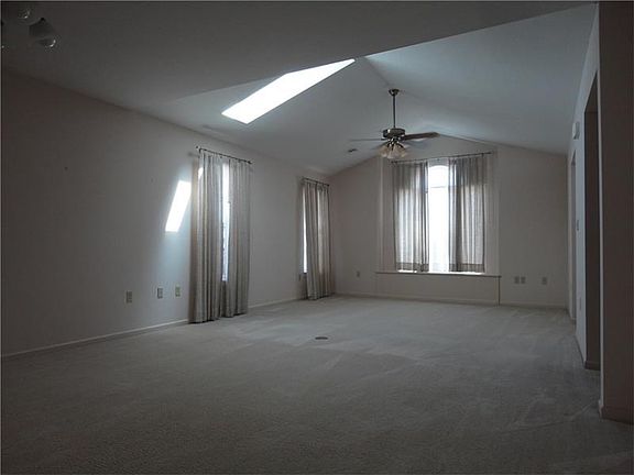 Living/Dining area with just natural daytime lighting from skylight