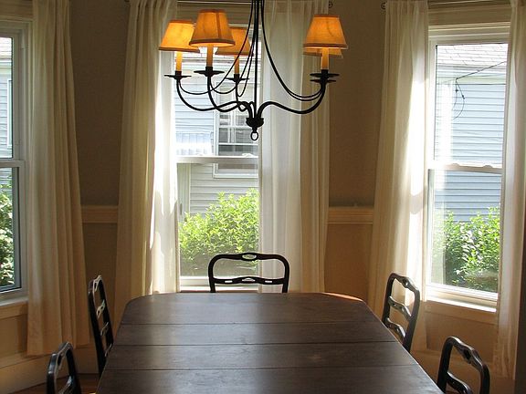 Formal dining room with bay window