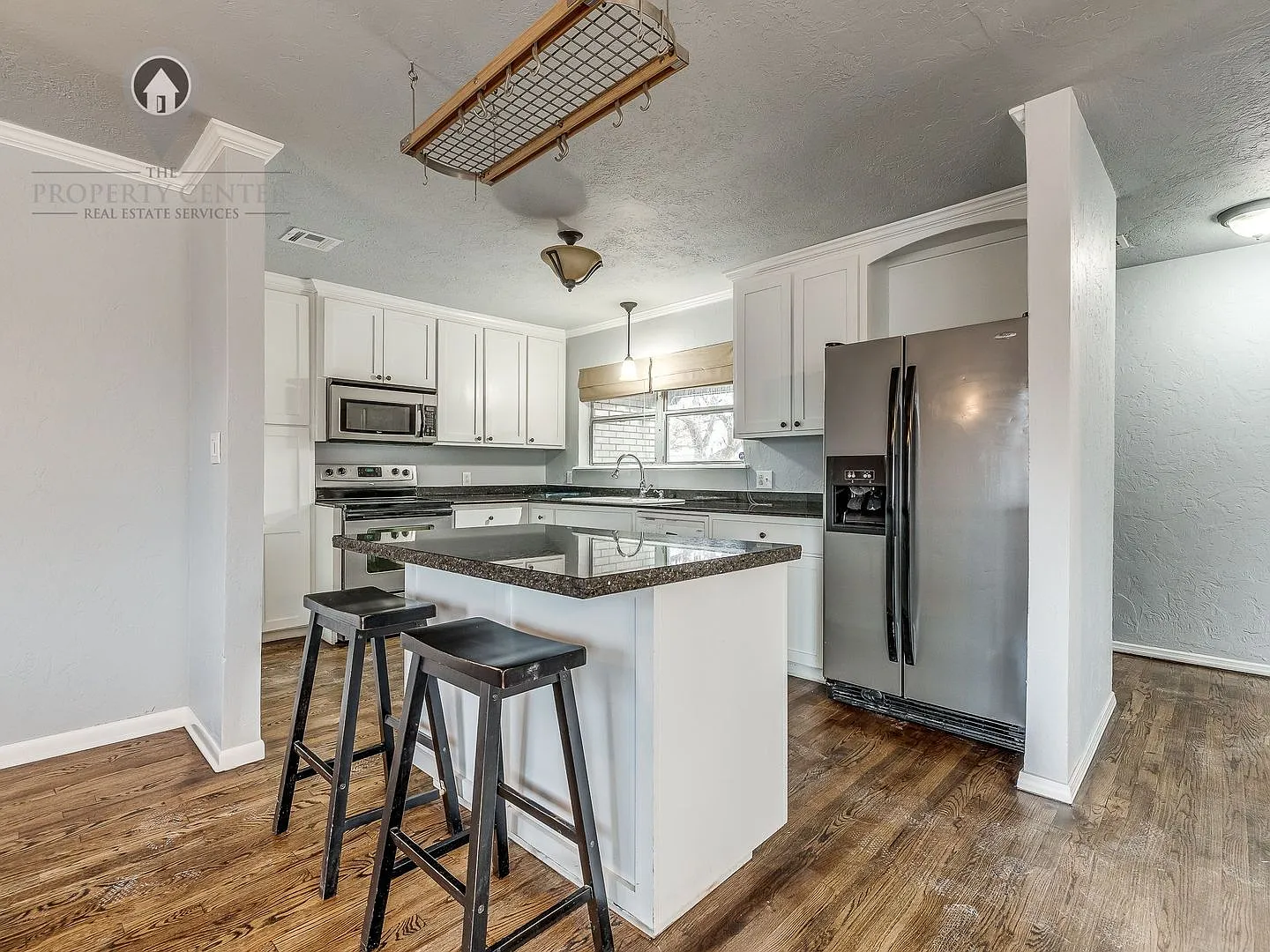 Updated Corner-Lot Home in The Village with a Spacious Backyard! — Photo 3