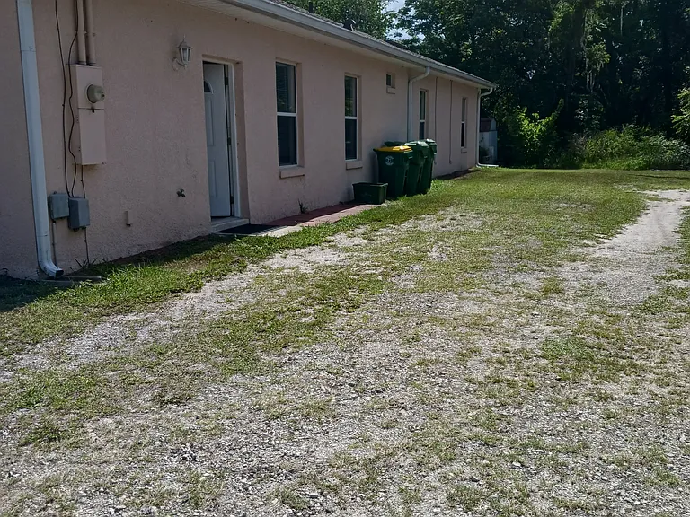 Side parking spot for 2 private vehicles.