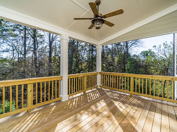 Secluded large covered deck with ceiling fan