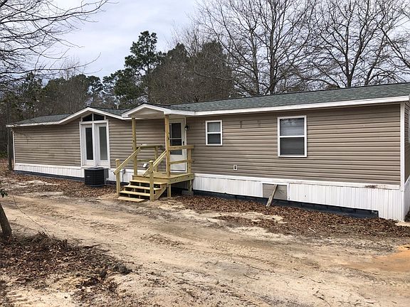 Back covered entrance into Kitchen