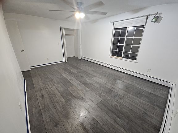Second upstairs bedroom with closet