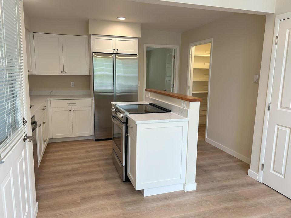 View as you enter the duplex into the kitchen and dining area