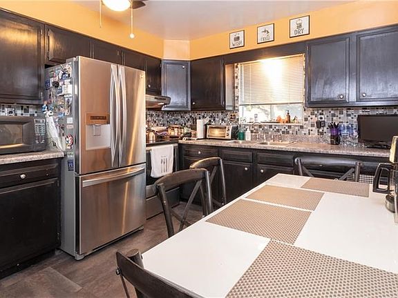 Prepare your family meals in this spacious well equipped updated kitchen.  No shortage of storage space in this kitchen.