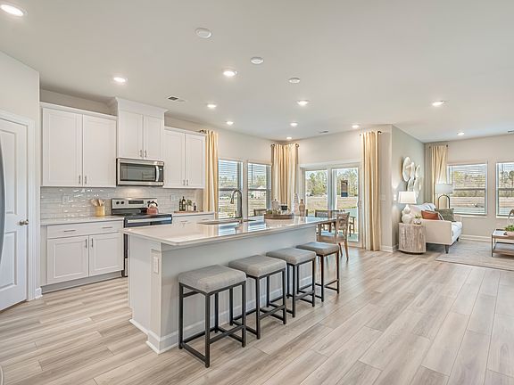 Newport floorplan modeled at another Meritage Homes 174 community.