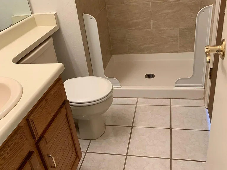 Bathroom connected to 2nd bedroom.