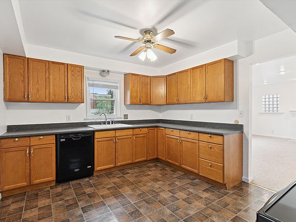 Kitchen with all appliances including dishwasher