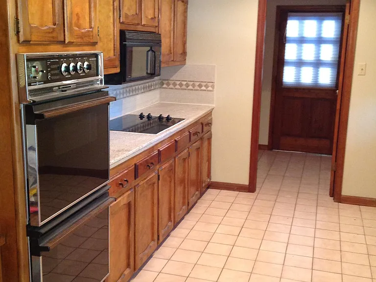 Kitchen Showing Laundry Area and Back Door