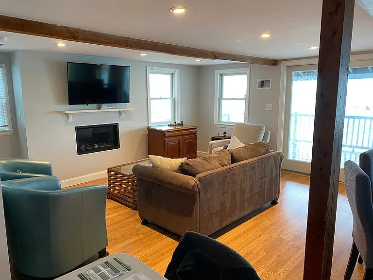 Living Room with TV and Fireplace