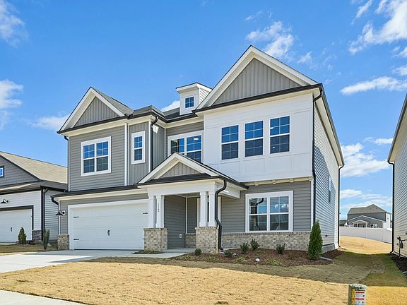 Exterior - Earthy textures and warm tones feel rooted in place.