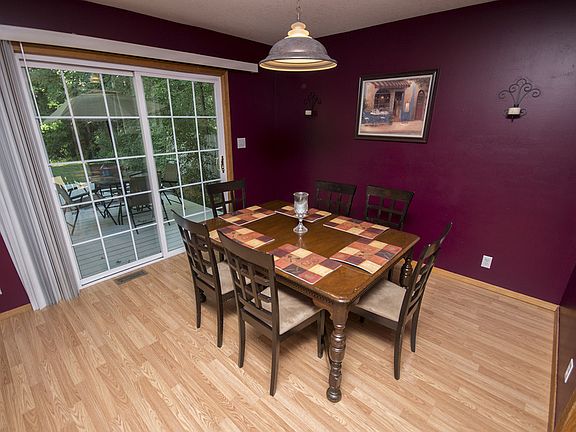 The living room attaches directly to the large formal dining room (12x11) that is flooded with natural light pouring in from the sliding glass door that leads to the back deck.