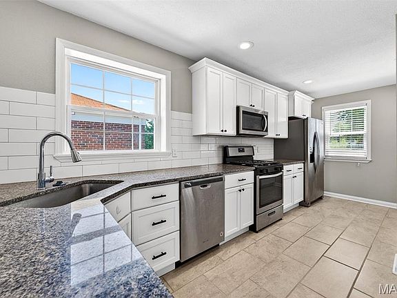 4th image of 8832 Lawn Ave