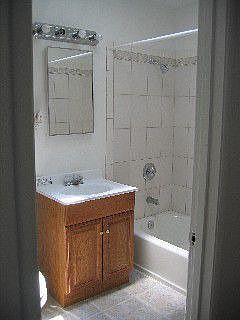 One of two remodeled full baths