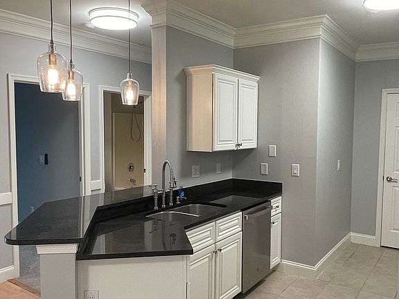 New lighting and GE appliances. Freshly painted cabinets.