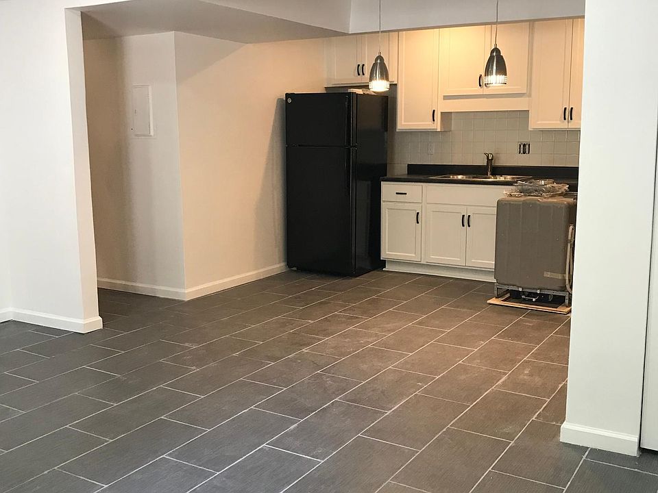 Kitchen/ dining/ partial living room.
