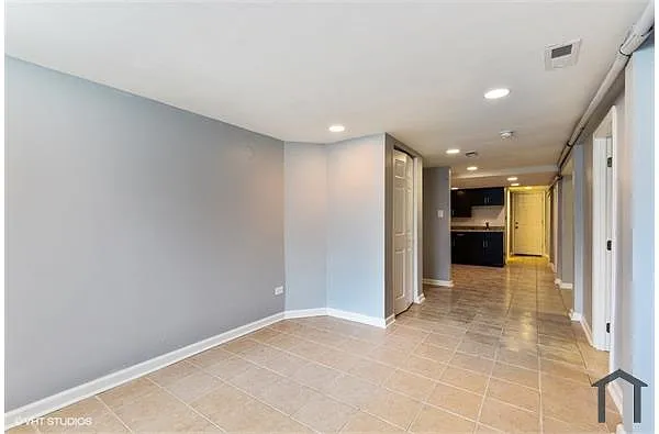 Building Photo - 6610 S Rhodes Ave #GRDN