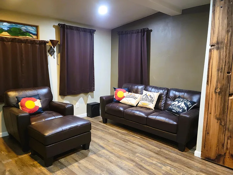 Living Room with handmade stained glass window.