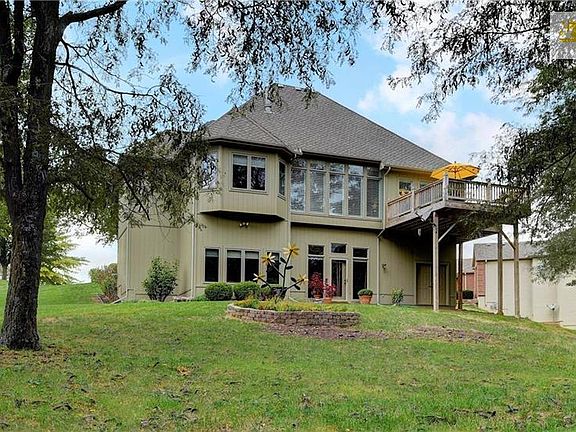 Backyard is fully wooded with much privacy from your neighbors. Enjoy the deer and wildlife as they visit while you're having your morning or afternoon beverages! Notice the tall windows that allow the light inside!