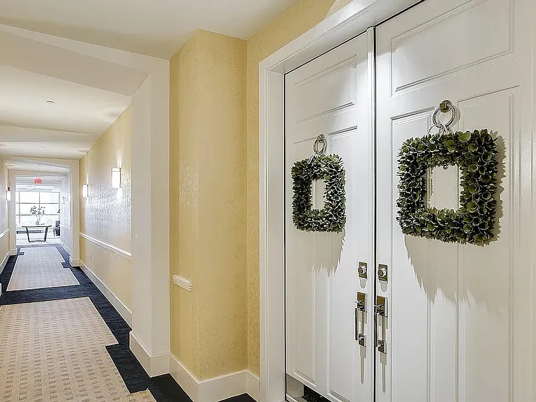 Outside entrance to condo and hallway