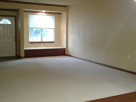 New living room carpet, window seat with storage