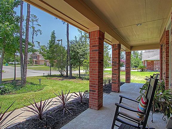 The long, covered front porch is a great spot to rock the evening away