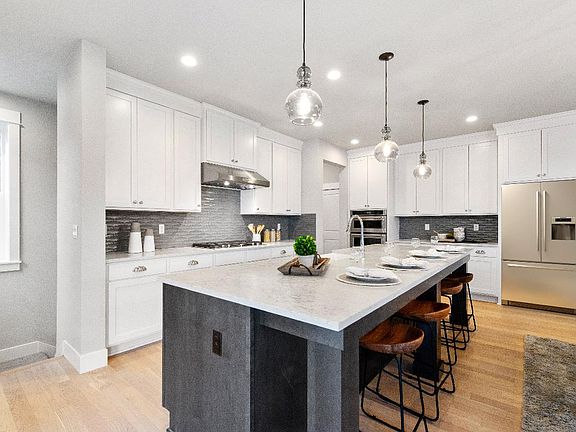 Spacious Kitchen with Large Center Island Apron Sink