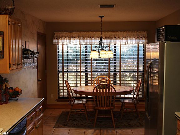 Laundry room to left