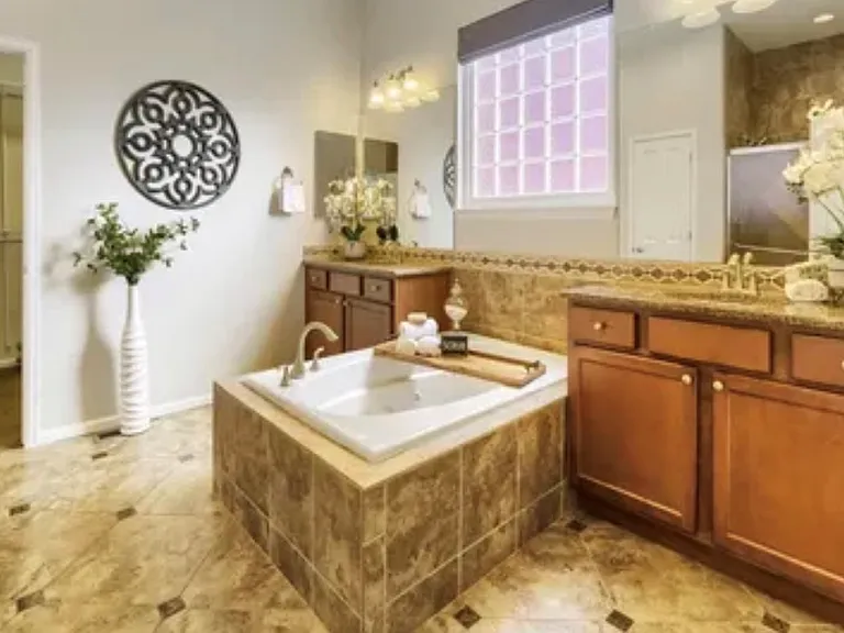Primary bathroom with walk in closet.