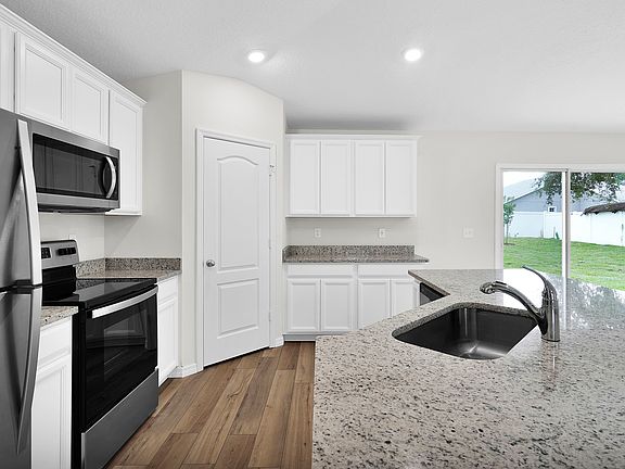 Family meals start here in this gorgeous upgraded kitchen