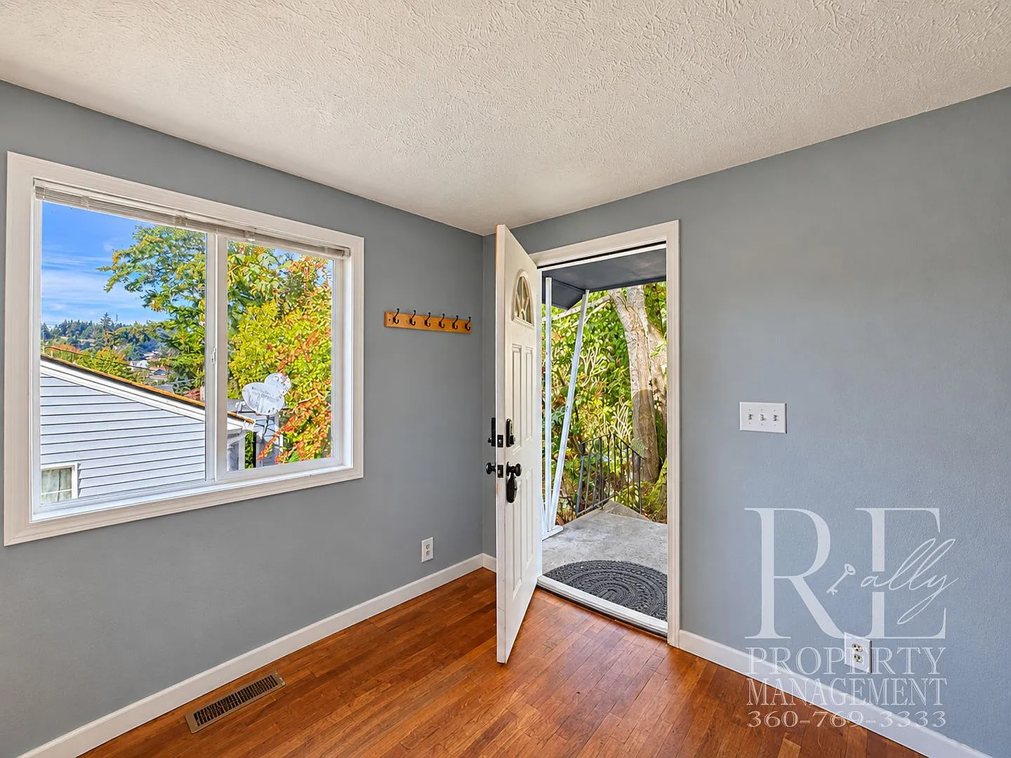 Charming 2-Bedroom Home with Original Hardwood Floors, Fenced Backyard & Abundant Storage — Photo 3