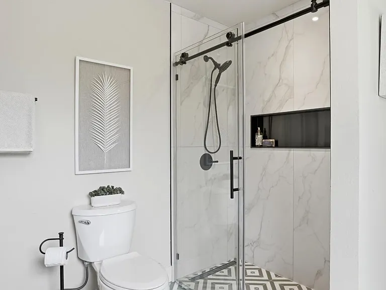 Walk-in shower with contemporary tilework