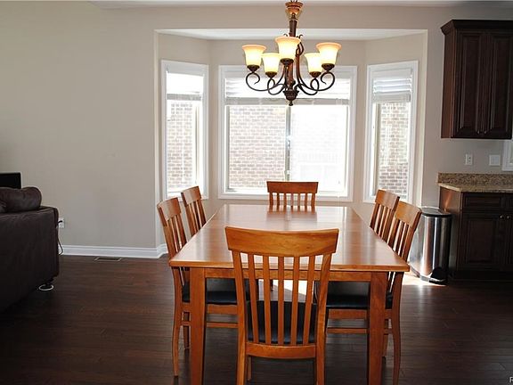 The sunlit dining room offers lots of table space for friends and family to enjoy your gourmet meals!