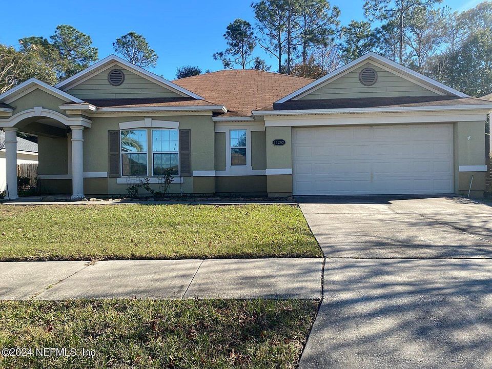 1st image of 11257 JUSTIN OAKS Drive N