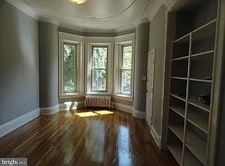 View of front living room looking towards the street/entry door.