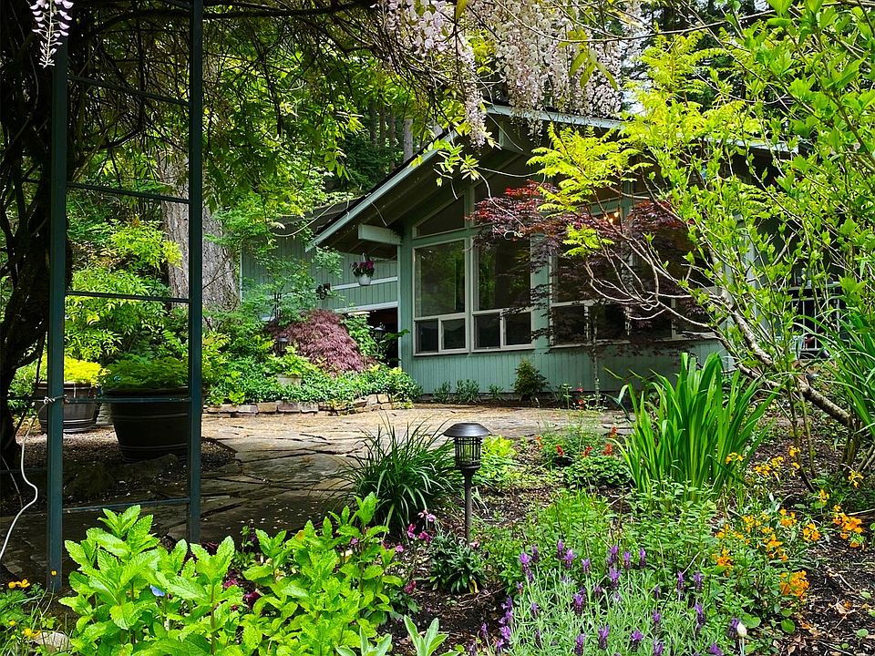Lush mature landscaping in the summer.