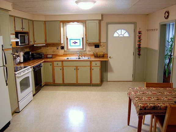 front door and kitchen