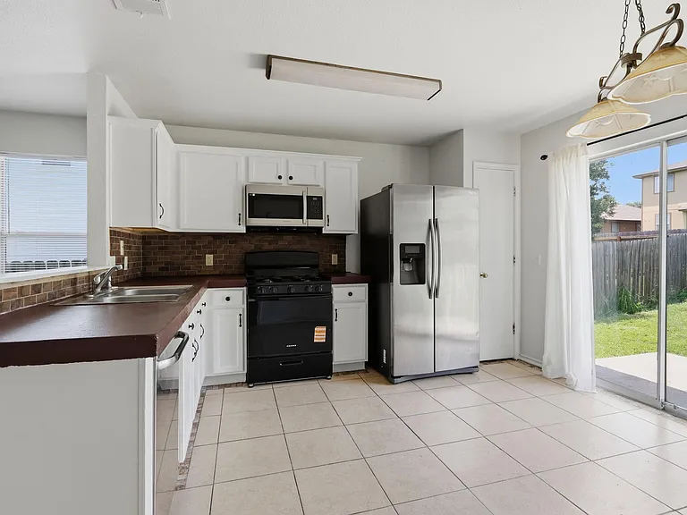 14910 Mossycup Ln — Photo 5