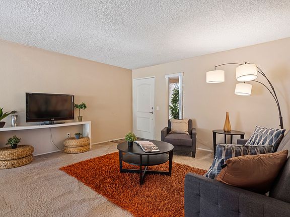 Welcoming living room at River Oaks in Oceanside, CA